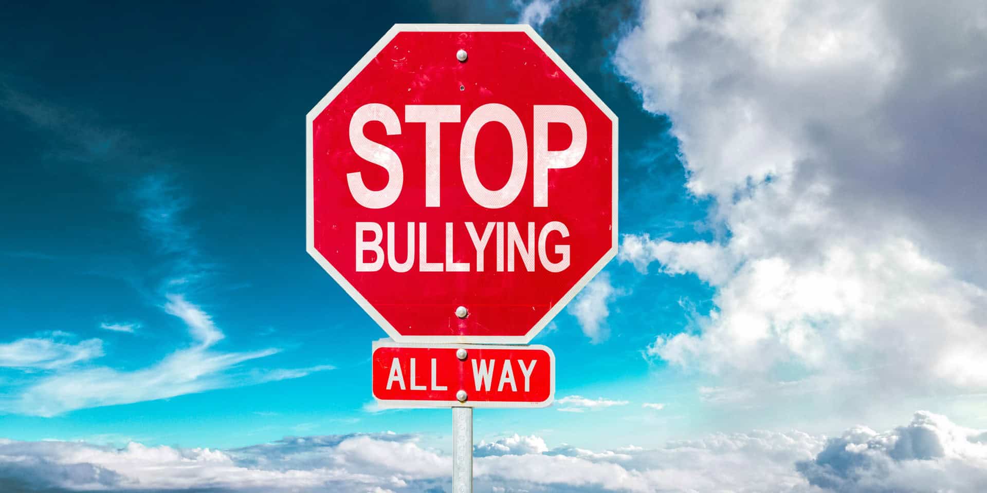 Sign post with words that say "Stop Bullying All the way"