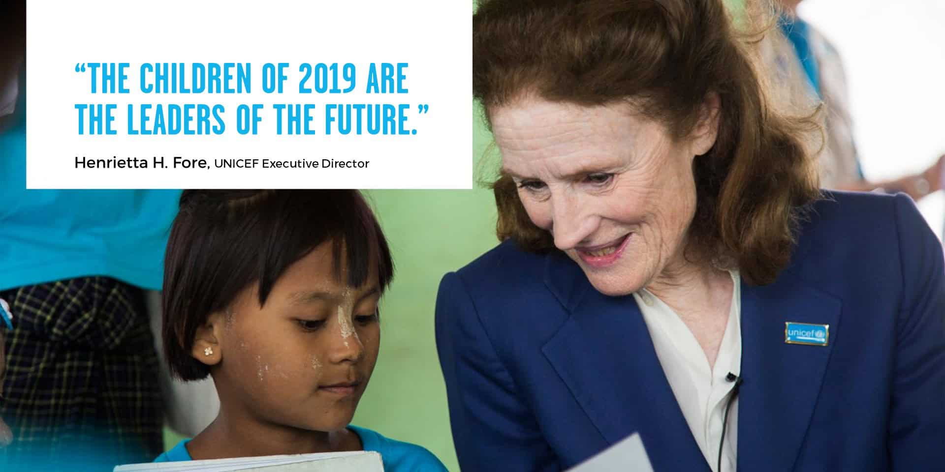 UNICEF Executive Director Henrietta Fore with a child. In the photo a box with the caption "The children of 2019 are the leaders of the future".