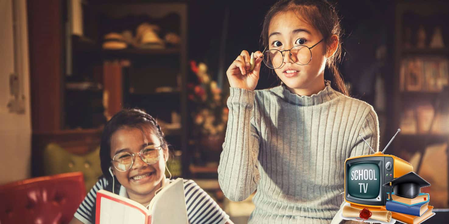 Two girls hanging out to learn. One is reading a box. Another is holding her spectacles down. At the bottom is an icon that says School TV.