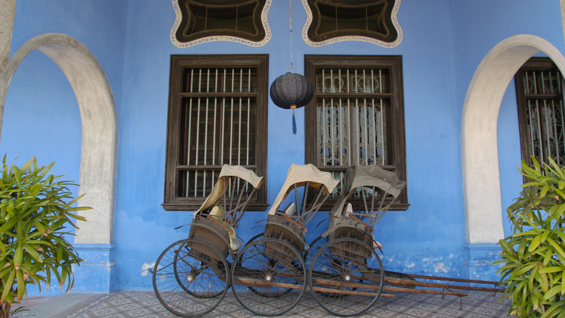 Trishaws parked in Penang city.