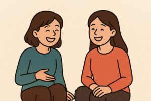Twi girls laughing together.