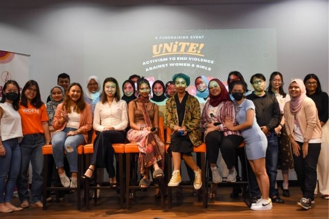 A group of women on stage.